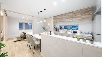 Full-size fridge, microwave, stovetop, electric kettle