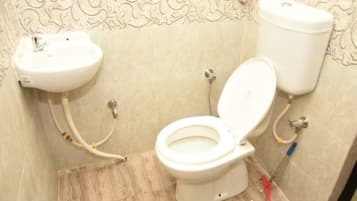 Shower, rainfall showerhead, designer toiletries, towels