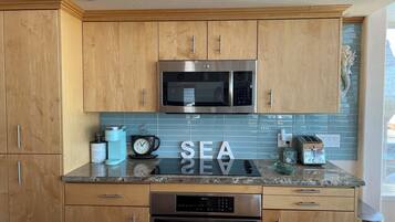 Fridge, stovetop, coffee/tea maker, cookware/dishes/utensils