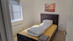 4 bedrooms, iron/ironing board, WiFi (free), bed sheets