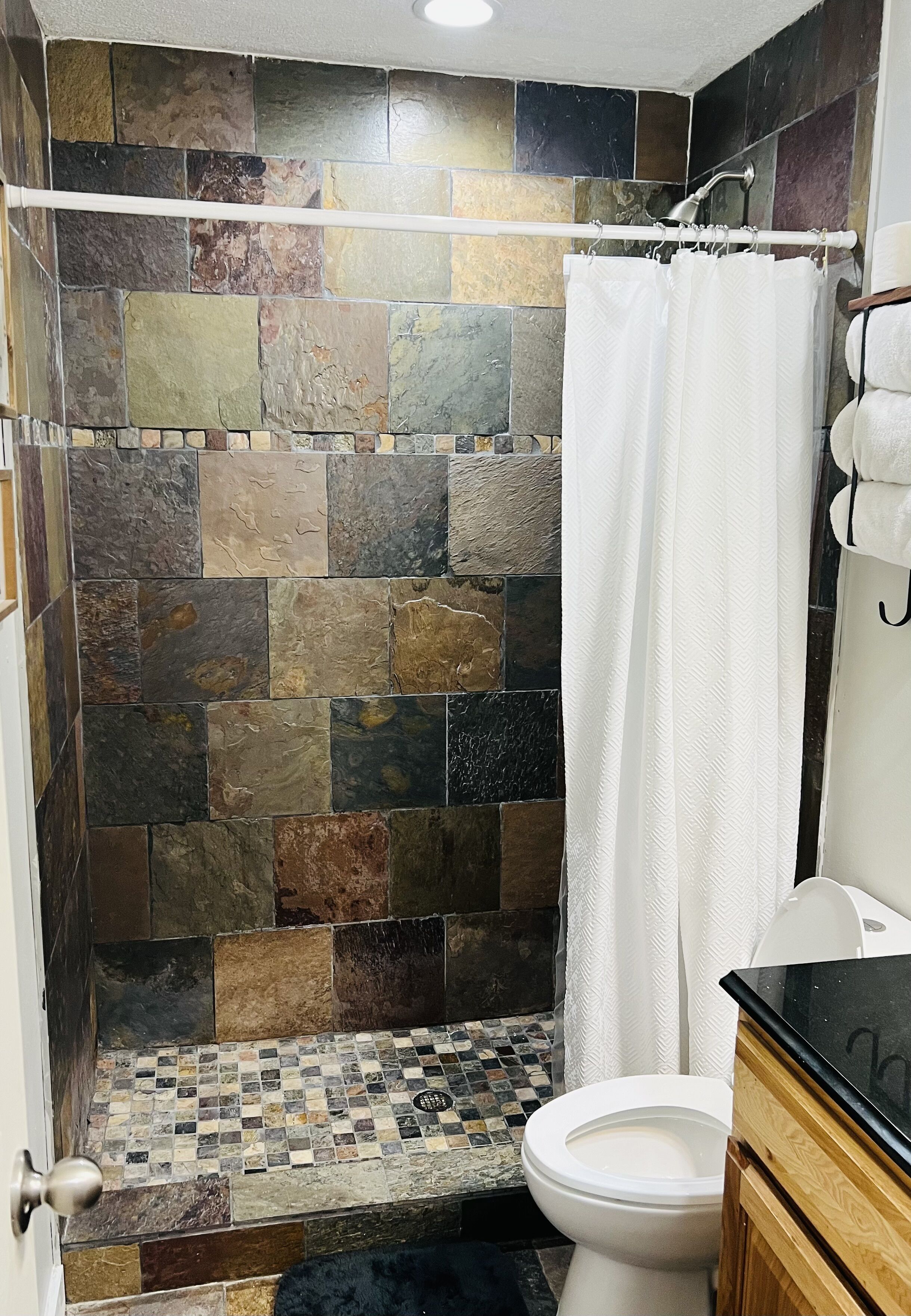 Shower, towels, soap, shampoo