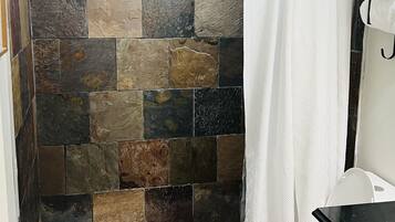 Shower, towels, soap, shampoo
