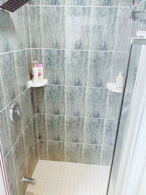 Jetted tub, hair dryer, slippers, towels