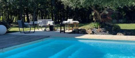 Seasonal outdoor pool, pool umbrellas, sun loungers