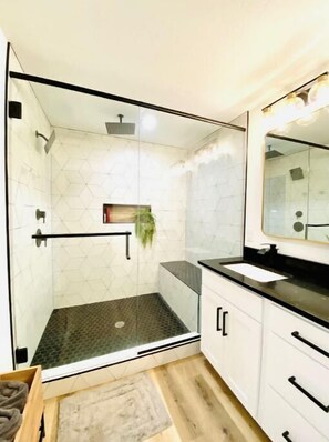 Shower, hair dryer, towels, soap
