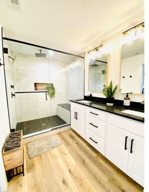 Shower, hair dryer, towels, soap