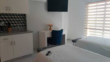 1 slaapkamer, een bureau, een strijkplank/strijkijzer, gratis wifi