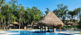 Relaxing new condo in colonia. 5 min drive to beach!