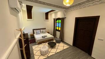 Comfort Room | Blackout drapes, soundproofing, iron/ironing board, free WiFi
