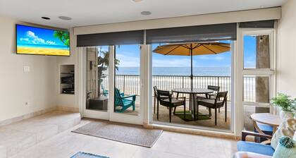 Toes-in-the-sand at A Wave from It All Beachfront Bliss