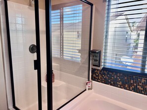 Shower, hair dryer, towels, soap