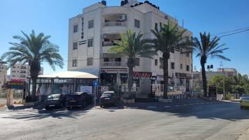 Residents can enjoy a balcony with views of the surrounding area from this apartment.