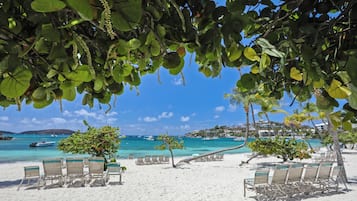 On the beach, sun-loungers, beach towels