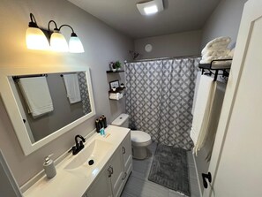Hair dryer, towels, soap, shampoo