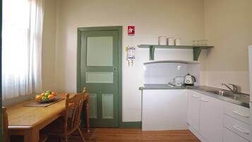 Fridge, microwave, toaster, cookware/dishes/utensils