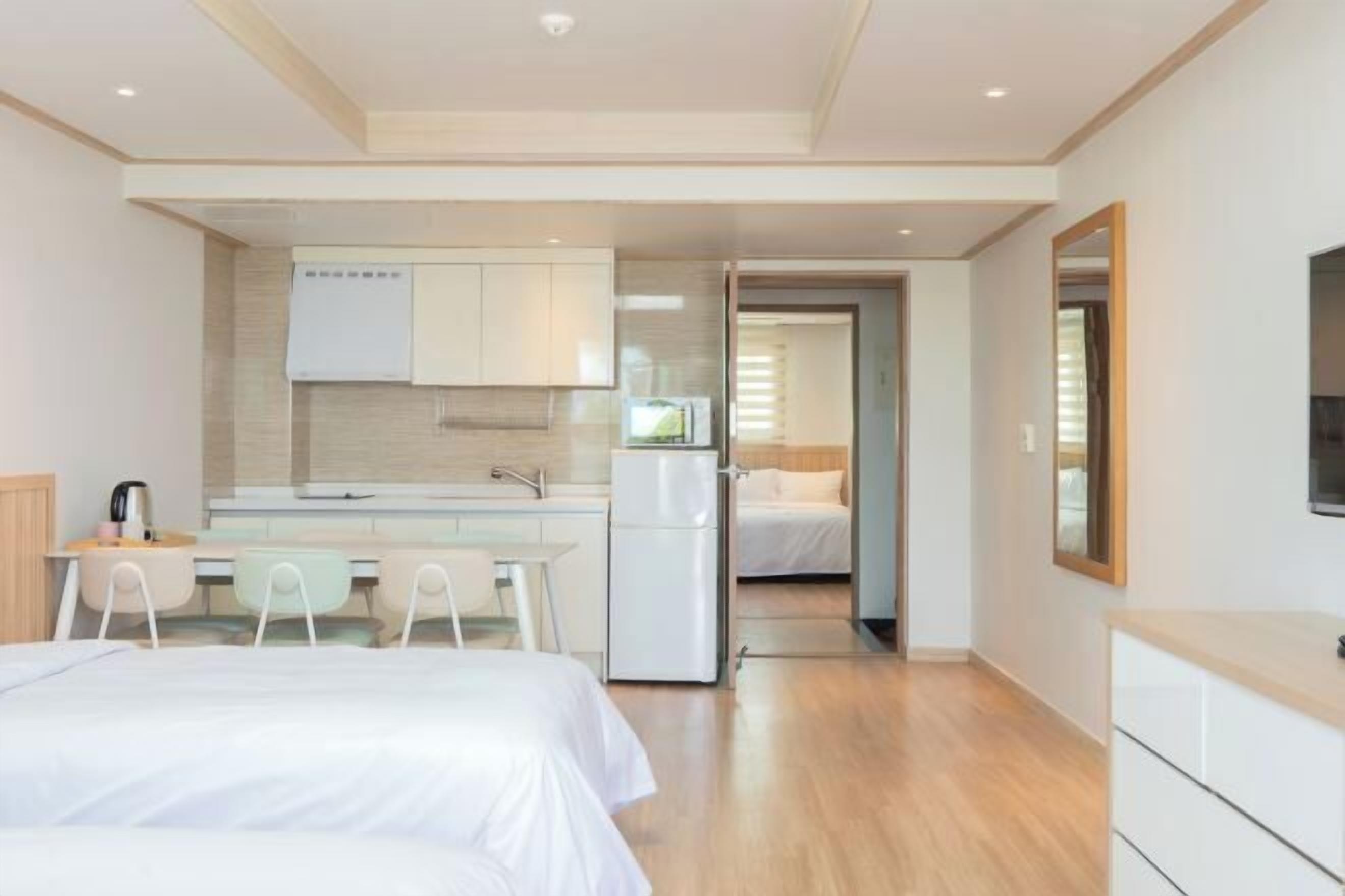 Desk, laptop workspace, free WiFi, bed sheets