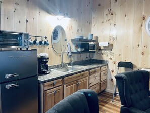 Fridge, microwave, stovetop, coffee/tea maker