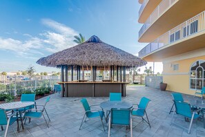 Outdoor dining - Ocean-view 10th-floor condo with balcony, heated outdoor pool, hot tub, gym, W/D (Panama City Beach)