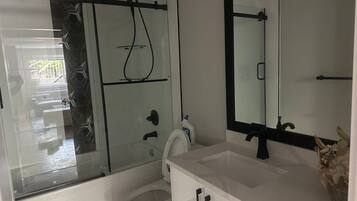 Hair dryer, towels, soap, shampoo