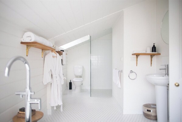 Hair dryer, towels, soap, toilet paper