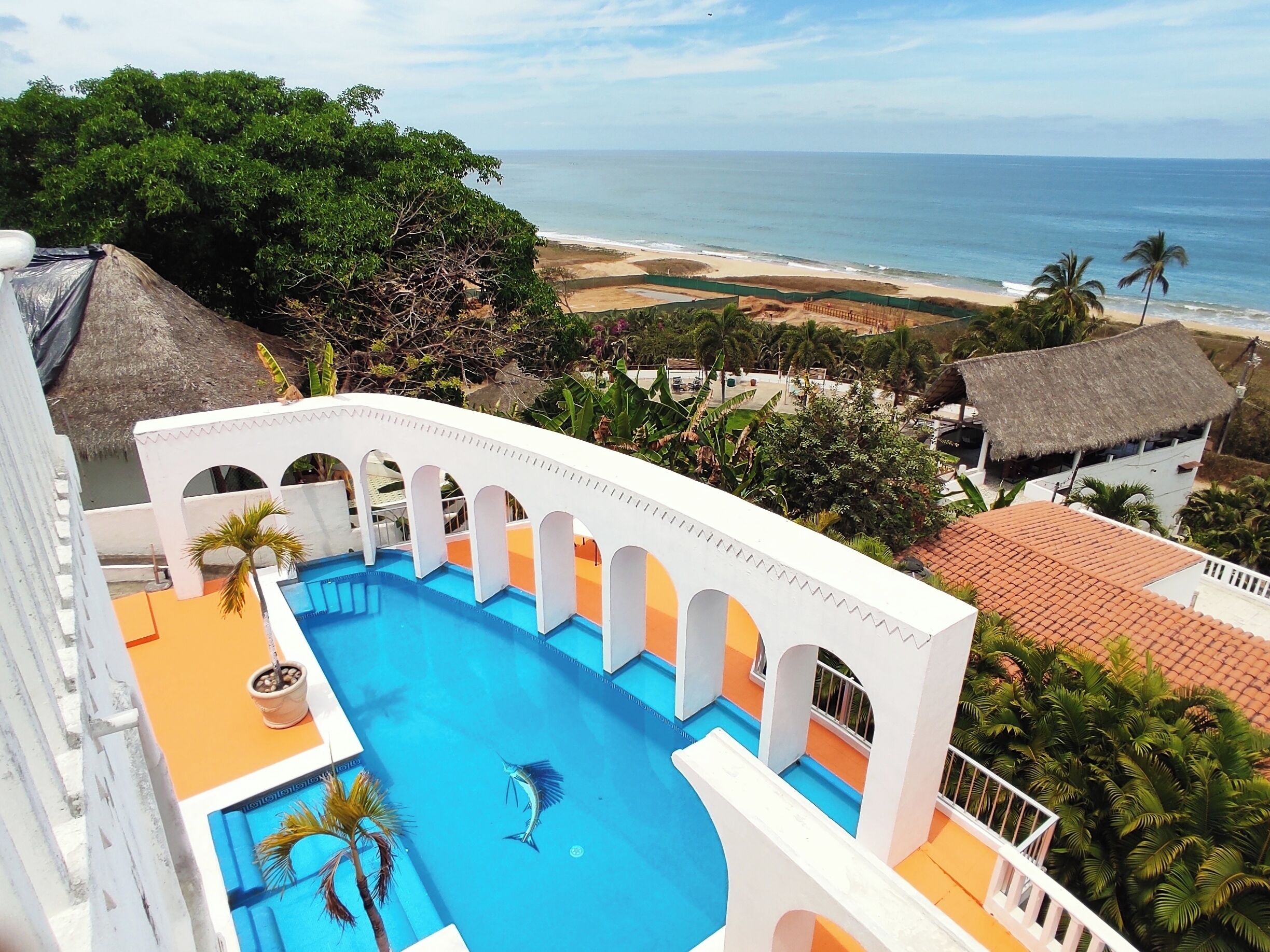 Outdoor pool, open 9:30 AM to 8:00 PM, pool loungers