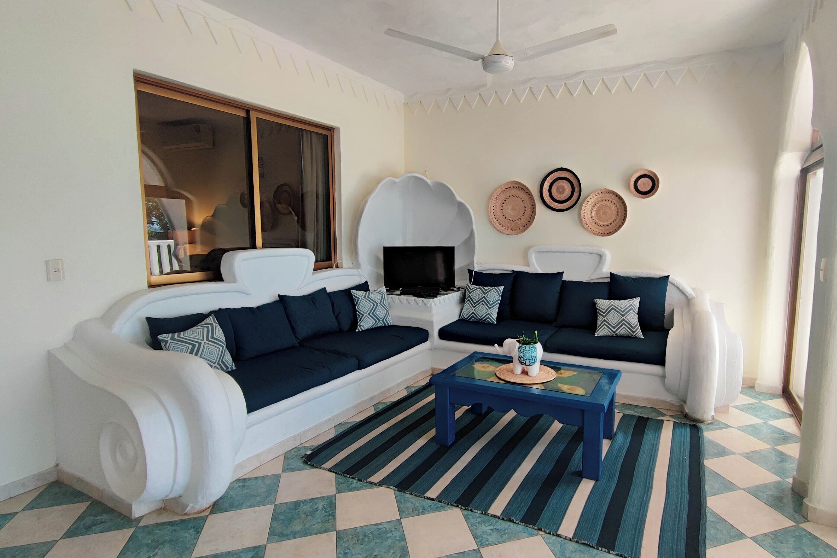 Family Apartment | Living area | 32-inch flat-screen TV with satellite channels