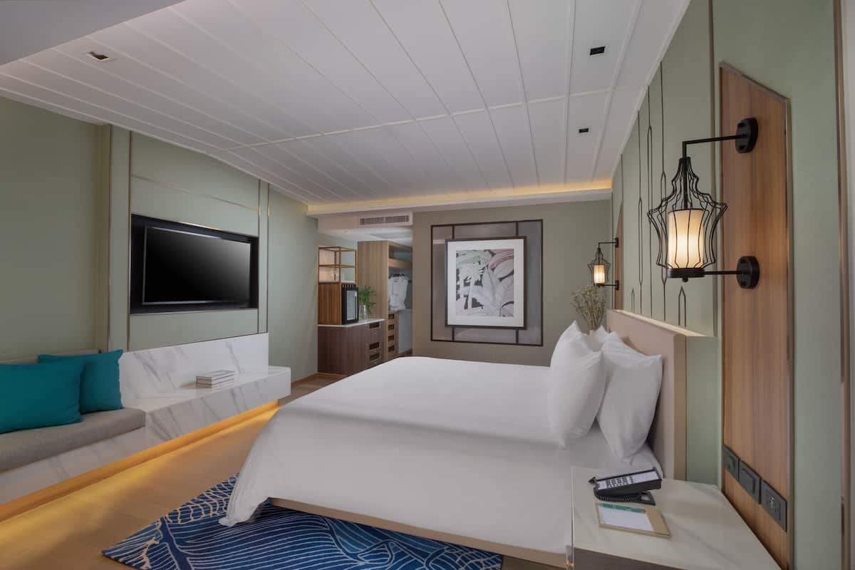 Luxe beddengoed, een minibar, een kluis op de kamer, een bureau