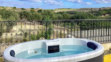 Family Villa, Multiple Bedrooms, 2 Bathrooms (Pleasant stone house & jacuzzi St) | Outdoor spa tub