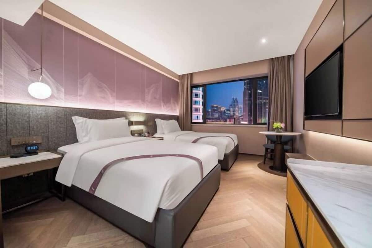 Down comforters, free minibar items, in-room safe, blackout drapes