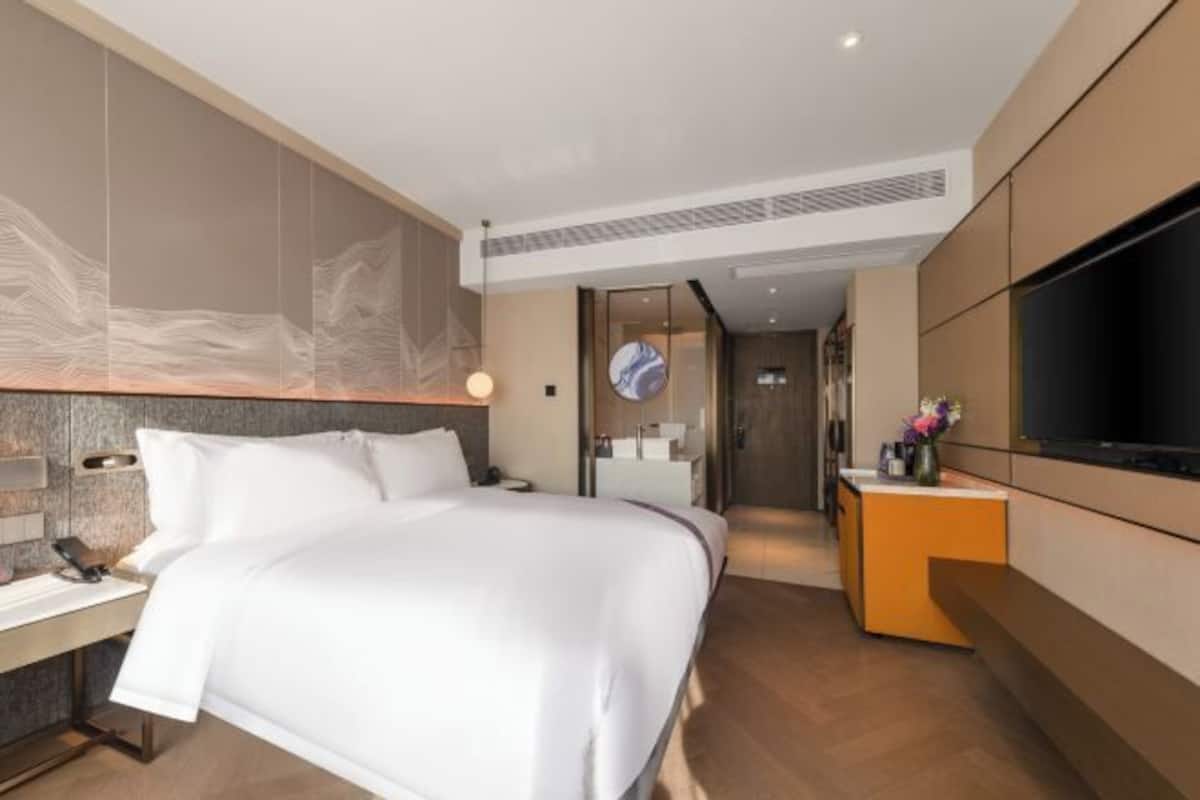 Down comforters, free minibar items, in-room safe, blackout drapes