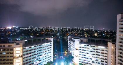 Cozy Haven by ER: Condo Studio near EVER CMW QC w/ WiFi, Pool, Balcony and more!