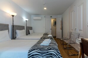 9 habitaciones, caja de seguridad en la habitación y escritorio