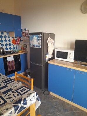 Private kitchen - Red coast apartment x 2 terrace sea view Swimming pool sunbeds, umbrellas (Trinità d'Agultu e Vignola)