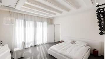 Habitación Deluxe | 1 habitación, minibar, caja de seguridad en la habitación y escritorio