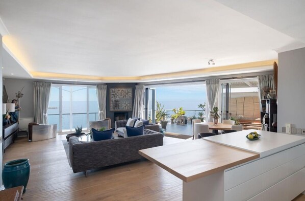 Luxury Apartment, 4 Bedrooms, River View, Oceanfront | Living area | IPod dock - Bayside Apartments (Cape Town)