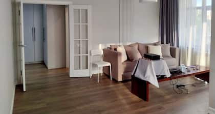 Modern & spacious, cozy balcony to mountains from Bishkek Center.