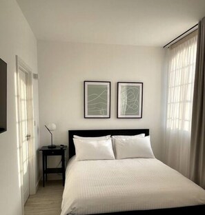 2 chambres, fer et planche à repasser, Wi-Fi gratuit, draps fournis