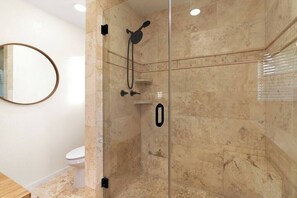 Bathtub, hair dryer, shampoo