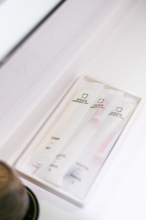 A close-up of a product packaging with text and logos.