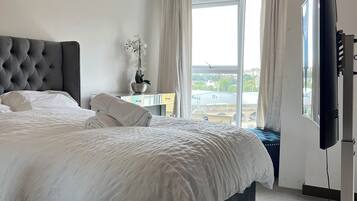 Apartment, 1 Queen Bed | 1 bedroom, iron/ironing board, free WiFi, bed sheets