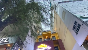 A building with a sign for 'Grandma Lu Baoan' and a staircase leading to the entrance. - Grandma Lu's Saigon Japan Town (Ho Chi Minh City)