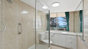 Bathtub, hair dryer, towels