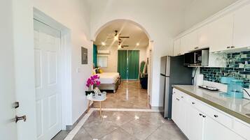 Deluxe Single Room, 2 Double Beds, Balcony | Free minibar, in-room safe, individually decorated