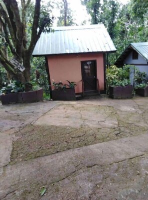 Surrounded by nature, this serene space offers a tranquil atmosphere for relaxation or focused work.