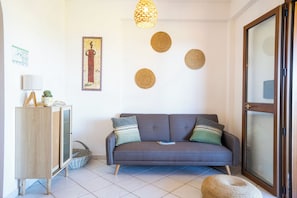 Deluxe appartement, 2 slaapkamers, terras, uitzicht op zee | Woonruimte