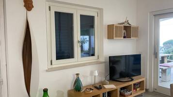 Villa Premium, 4 camere da letto, piscina privata, vista mare | Area soggiorno | Smart TV