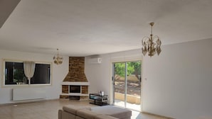 Villa, flere senger | Oppholdsområde | Peis