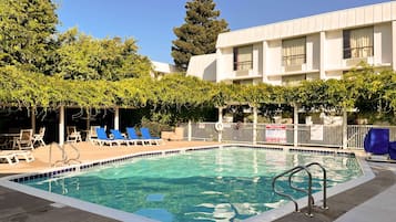 Outdoor pool, open 9:00 AM to 9:00 PM, pool umbrellas, sun loungers
