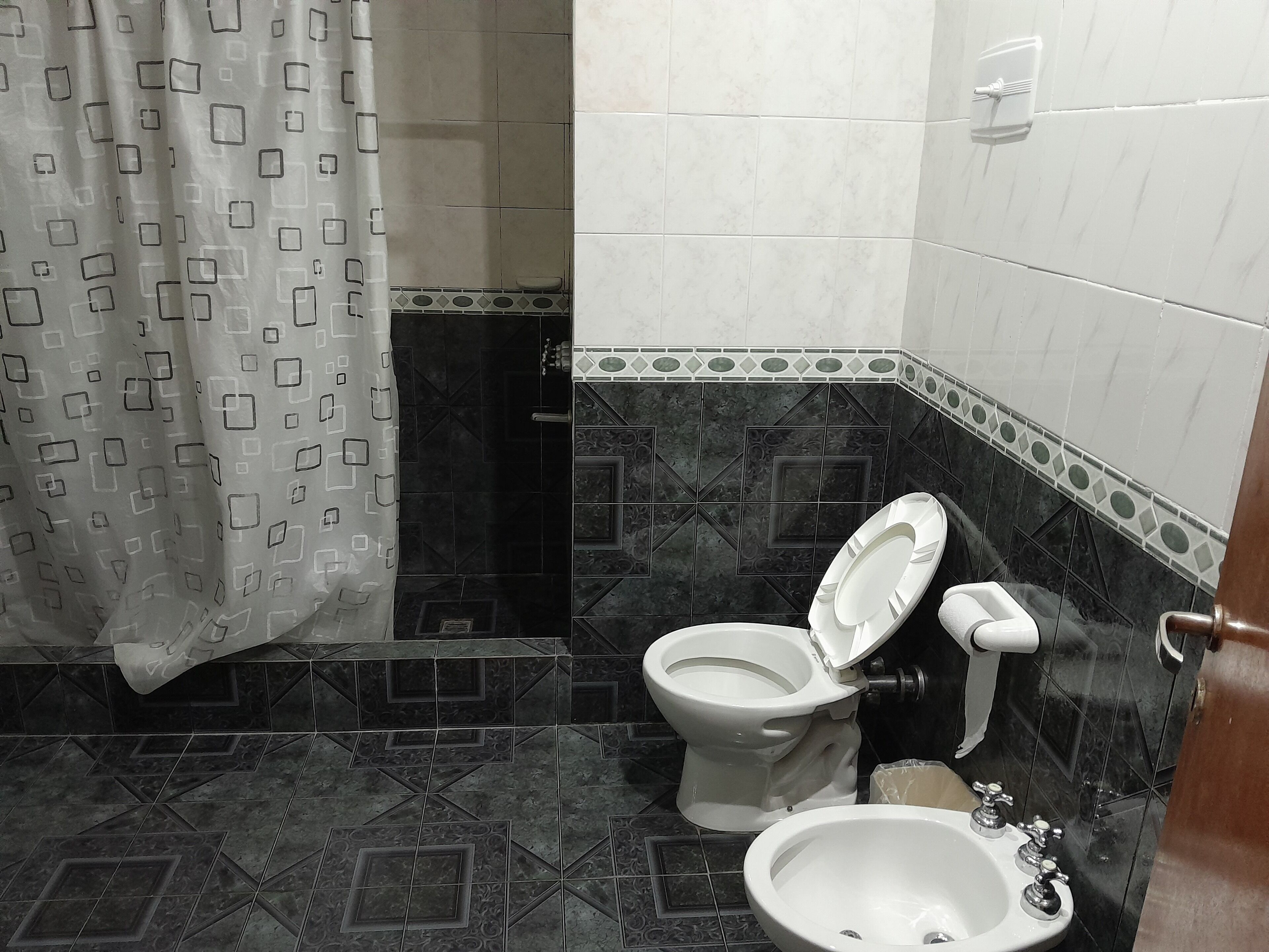 standard room, 1 queen bed | bathroom | shower, towels