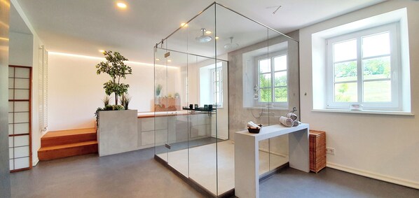 Shower, hair dryer, towels, soap